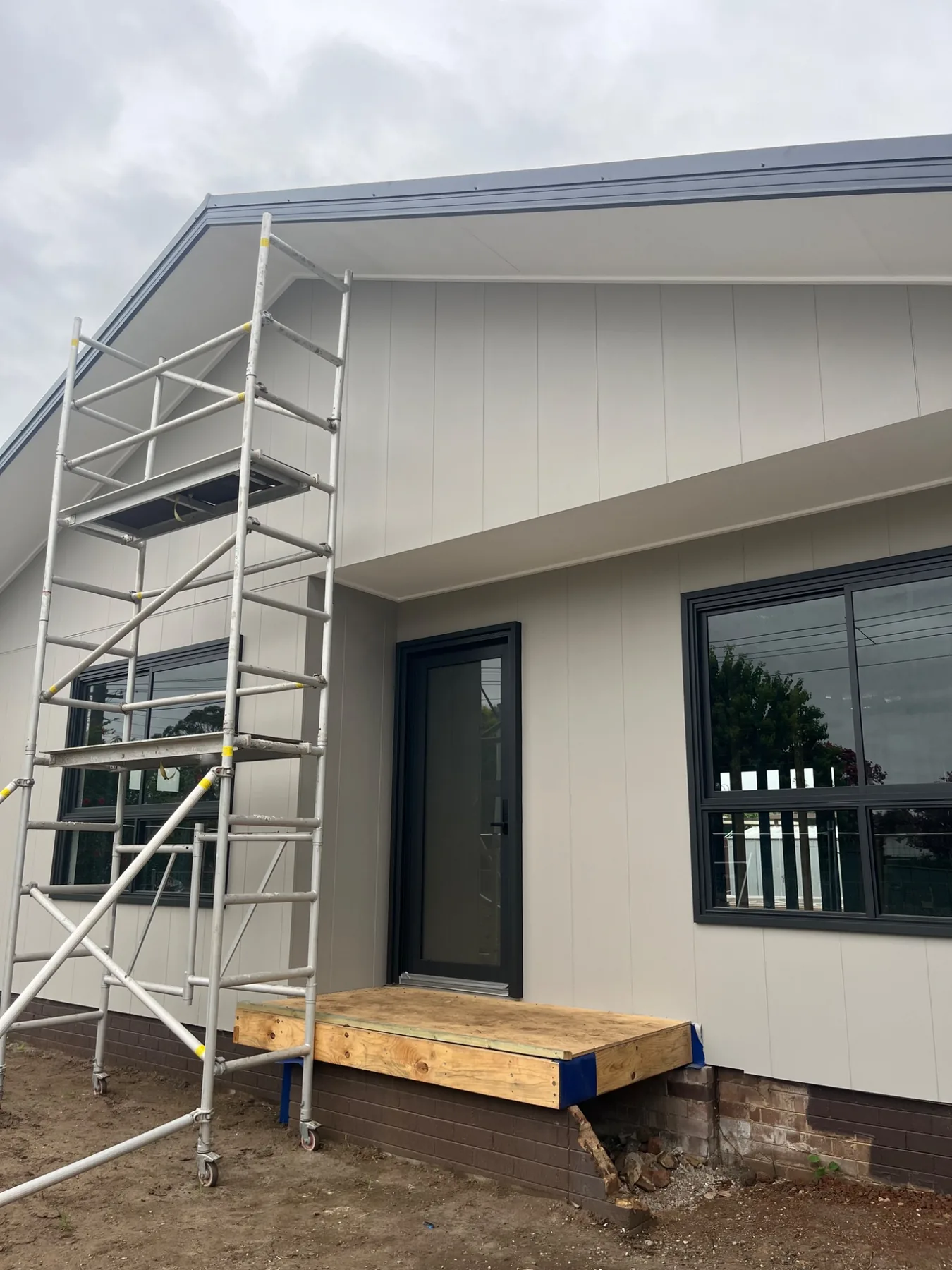 Completed exterior house painting project in Windsor