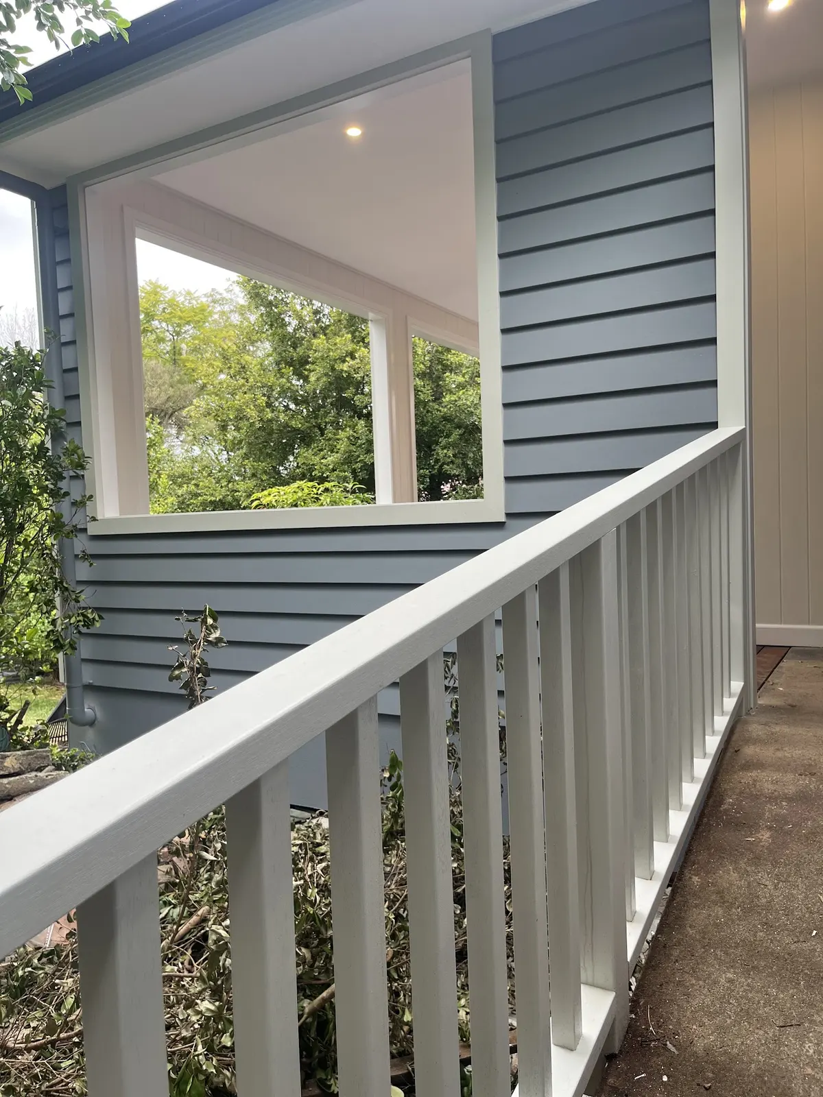 Freshly painted grey and white weatherboard exterior in Hawkesbury
